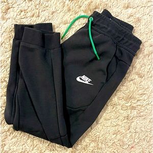 Nike Tech pants, charcoal gray, youth medium